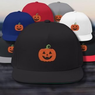 Close-up of five colorful caps featuring an embroidered jack-o'-lantern. Caps are black, red, gray, blue, and white, arranged against a blurred background.