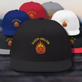 A collection of six colorful baseball caps featuring a flaming pumpkin design and "SLEEPY HOLLOW" text embroidery design. Caps are in black, red, gray, blue, and white.