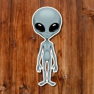 Cartoon alien with a large head and big black eyes stands on a wooden background. Its body is slender and gray, creating an eerie yet playful tone.