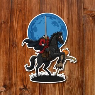 Sticker of a headless horseman on a rearing black horse, holding a pumpkin head and sword. The background features a full blue moon, all on a wooden surface.